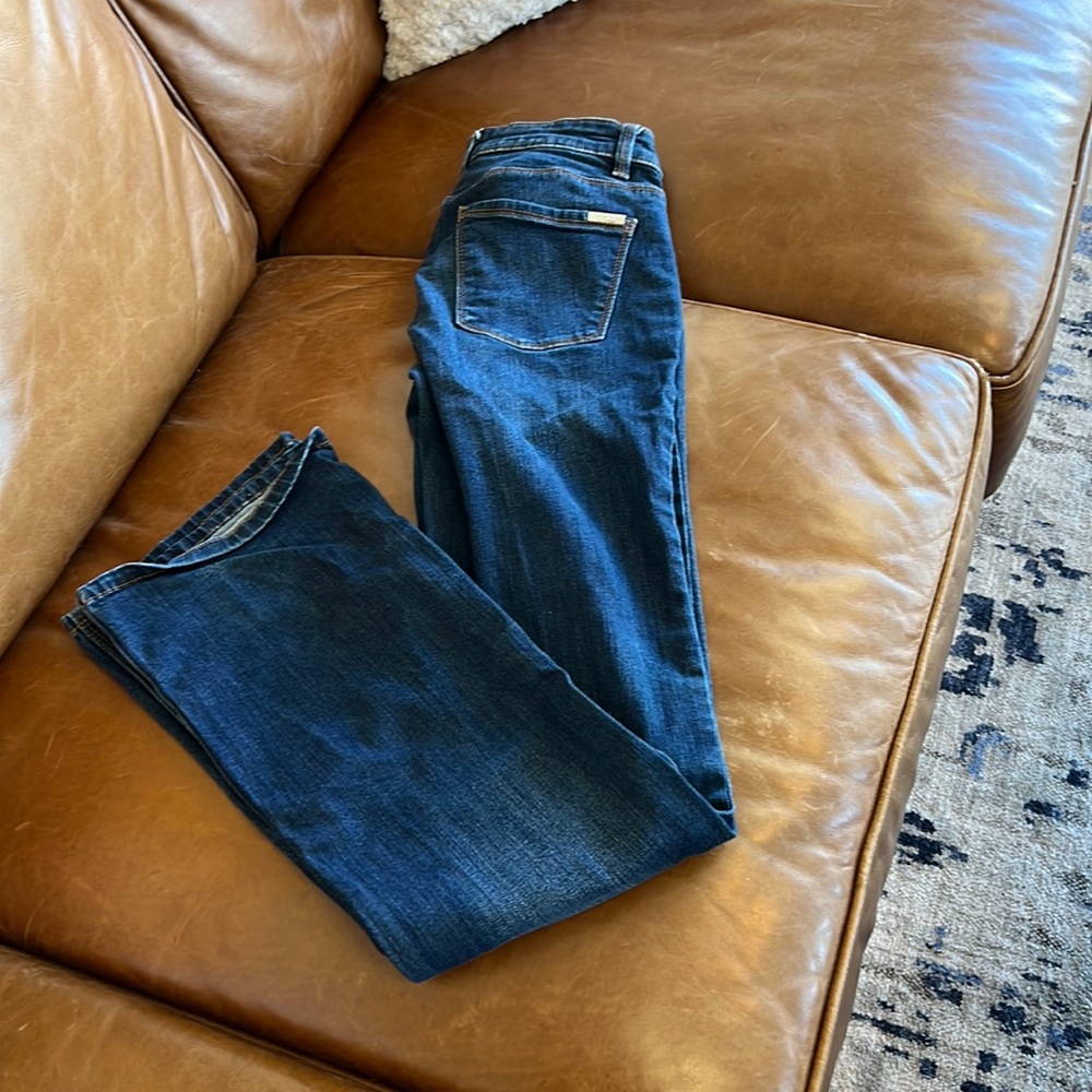 Fair to good condition, tiny grass stain on left leg. Bootcut.